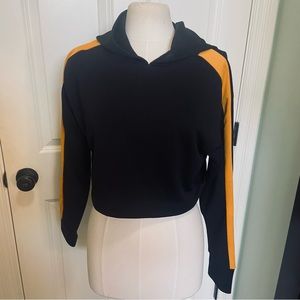 Forever 21 black cropped hooded sweatshirt with yellow stripe down sleeves
